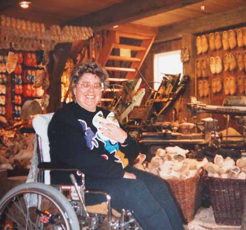 In wheelchair Nancy and Nate collect wooden shoes in Netherlands (Holland)